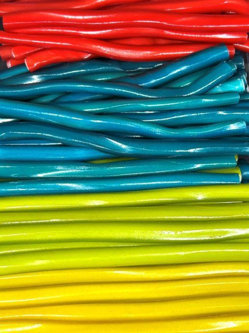 Jumbo Lisse Fini – grand bonbon réglisse fourré à la crème aux 4 saveurs fruitées